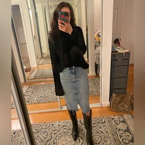 Small, black turtleneck